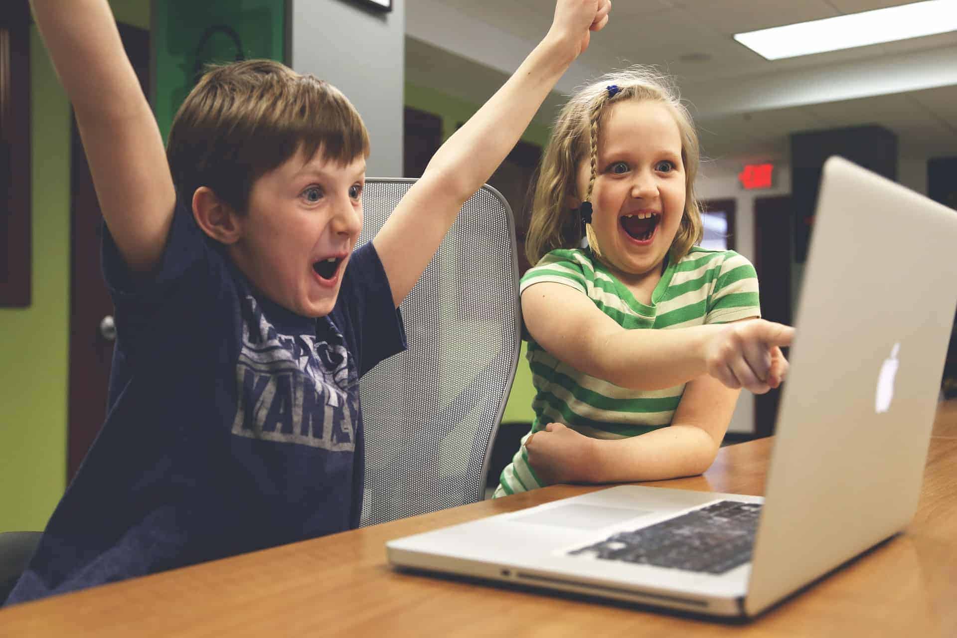 kids excited about laptop