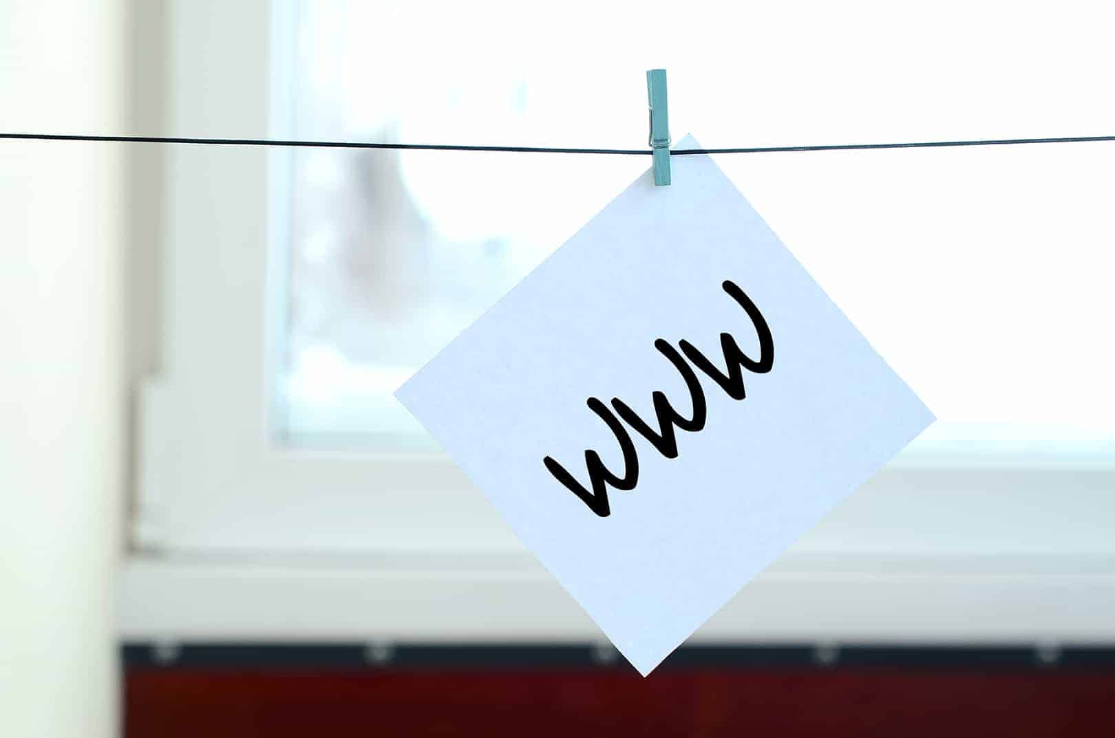 www. note is written on a white sticker that hangs with a clothe