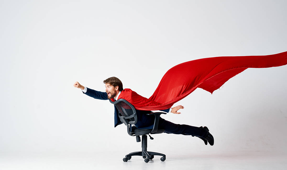 A Man In A Red Cloak Suit Ride In A Chair Superheroes