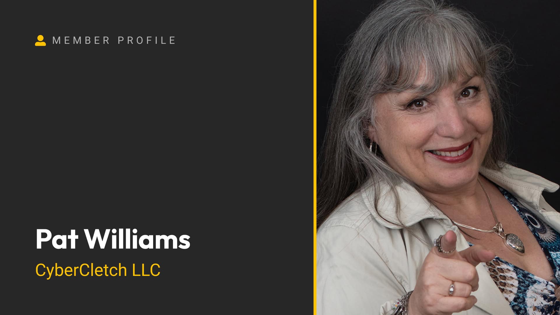 Pat Williams smiling and pointing at the camera in a professional photo.